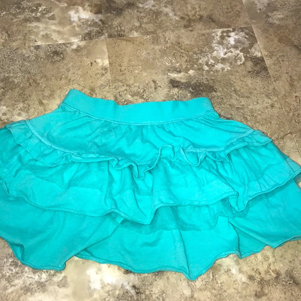 A cyan blue color skirt